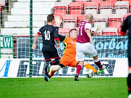 Ryan Scully saves from Paul Sheerin