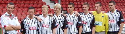 Jim McIntyre with new signings 2009