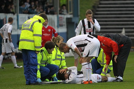 Steven Bell injured at Cappielow Park
