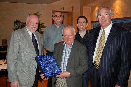 On behalf of the Centenary Club Jim Leishman made presentation to Jim McDonald